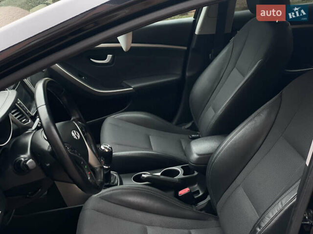 Чорний Хендай i30, об'ємом двигуна 1.6 л та пробігом 221 тис. км за 8650 $, фото 4 на Automoto.ua