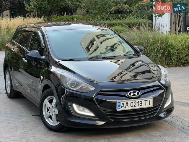Черный Хендай i30, объемом двигателя 1.58 л и пробегом 153 тыс. км за 9500 $, фото 6 на Automoto.ua