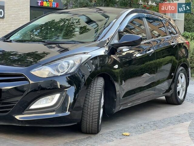 Черный Хендай i30, объемом двигателя 1.58 л и пробегом 153 тыс. км за 9500 $, фото 12 на Automoto.ua