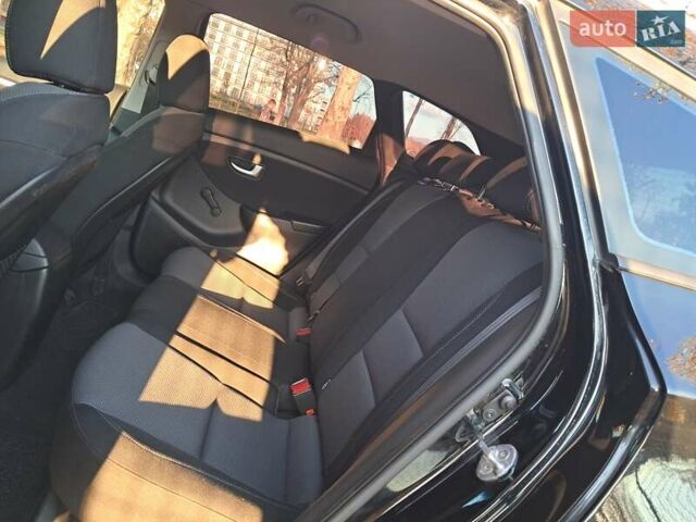 Черный Хендай i30, объемом двигателя 1.58 л и пробегом 132 тыс. км за 9500 $, фото 23 на Automoto.ua