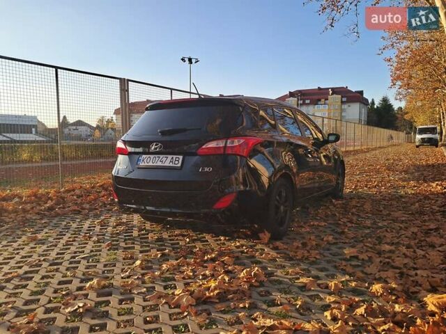 Черный Хендай i30, объемом двигателя 1.58 л и пробегом 132 тыс. км за 9500 $, фото 17 на Automoto.ua