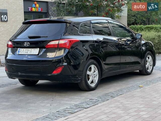 Черный Хендай i30, объемом двигателя 1.58 л и пробегом 153 тыс. км за 9500 $, фото 16 на Automoto.ua