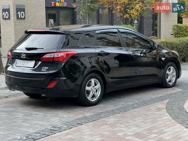 Хендай i30 2014 в Киеве на Automoto.ua Черный Хендай i30, объемом двигателя 1.58 л и пробегом 153 тыс. км за 8900 $, фото 12 на Automoto.ua