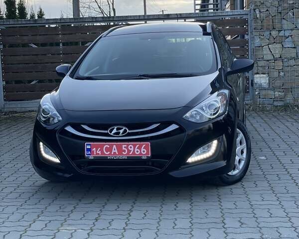 Чорний Хендай i30, об'ємом двигуна 1.58 л та пробігом 173 тис. км за 9995 $, фото 7 на Automoto.ua