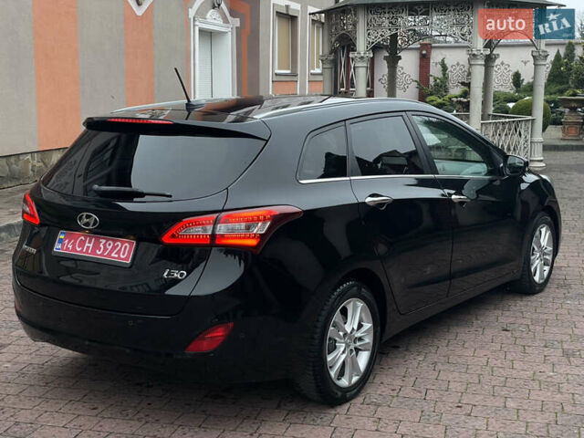 Чорний Хендай i30, об'ємом двигуна 1.6 л та пробігом 221 тис. км за 8650 $, фото 45 на Automoto.ua