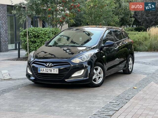 Черный Хендай i30, объемом двигателя 1.58 л и пробегом 153 тыс. км за 9500 $, фото 2 на Automoto.ua