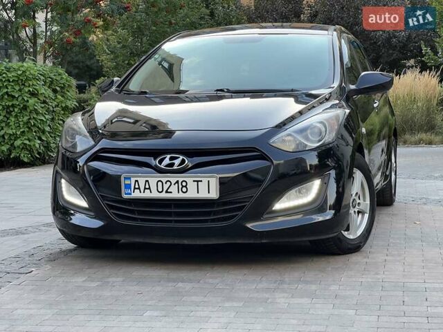 Черный Хендай i30, объемом двигателя 1.58 л и пробегом 153 тыс. км за 9500 $, фото 8 на Automoto.ua