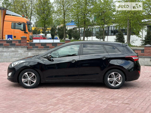 Чорний Хендай i30, об'ємом двигуна 1.6 л та пробігом 190 тис. км за 10800 $, фото 5 на Automoto.ua