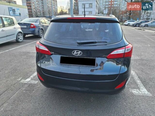 Чорний Хендай i30, об'ємом двигуна 1.58 л та пробігом 136 тис. км за 9100 $, фото 6 на Automoto.ua