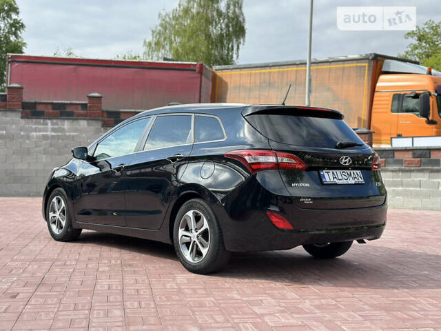 Чорний Хендай i30, об'ємом двигуна 1.6 л та пробігом 190 тис. км за 10800 $, фото 52 на Automoto.ua