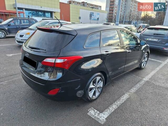 Чорний Хендай i30, об'ємом двигуна 1.58 л та пробігом 136 тис. км за 9100 $, фото 7 на Automoto.ua