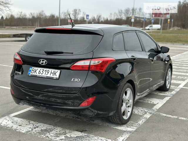 Чорний Хендай i30, об'ємом двигуна 1.58 л та пробігом 198 тис. км за 10250 $, фото 35 на Automoto.ua