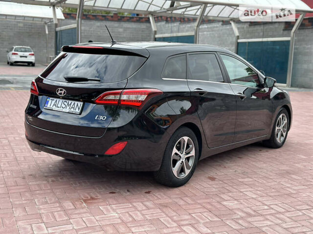 Чорний Хендай i30, об'ємом двигуна 1.6 л та пробігом 190 тис. км за 10800 $, фото 66 на Automoto.ua