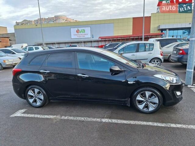 Чорний Хендай i30, об'ємом двигуна 1.58 л та пробігом 136 тис. км за 9100 $, фото 8 на Automoto.ua