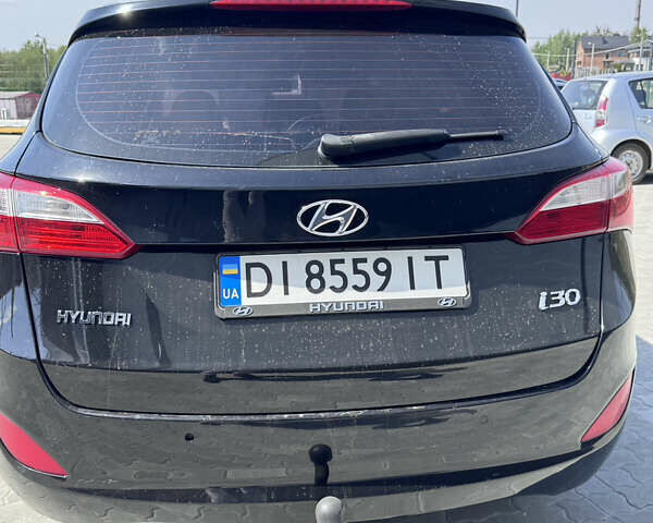 Черный Хендай i30, объемом двигателя 1.4 л и пробегом 283 тыс. км за 9500 $, фото 3 на Automoto.ua