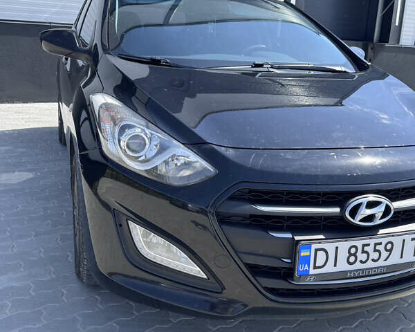 Черный Хендай i30, объемом двигателя 1.4 л и пробегом 283 тыс. км за 9500 $, фото 2 на Automoto.ua
