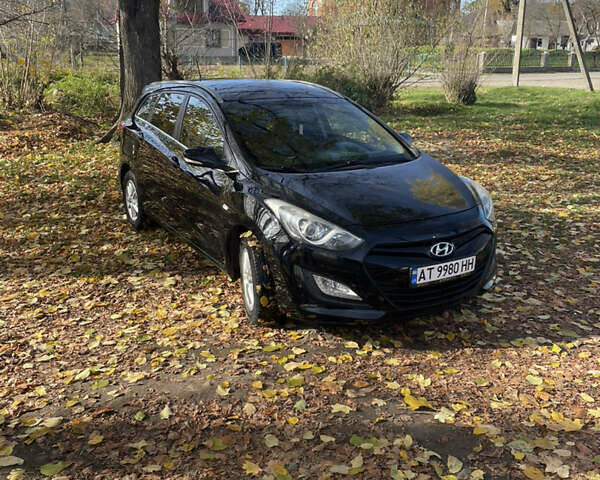 Черный Хендай i30, объемом двигателя 1.58 л и пробегом 290 тыс. км за 10800 $, фото 4 на Automoto.ua