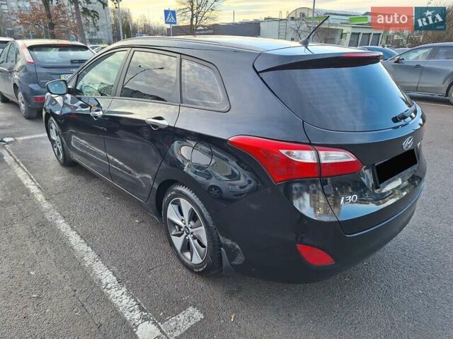 Чорний Хендай i30, об'ємом двигуна 1.58 л та пробігом 136 тис. км за 9100 $, фото 5 на Automoto.ua