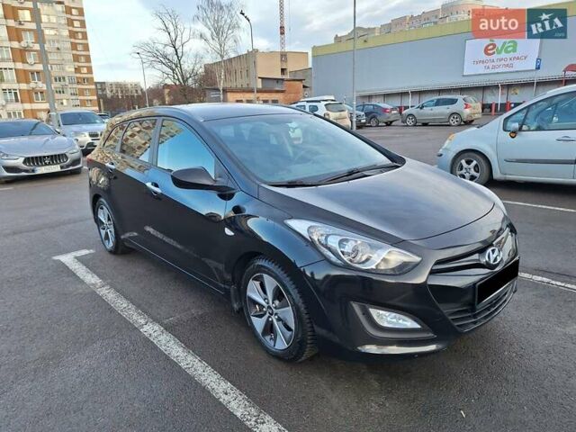 Чорний Хендай i30, об'ємом двигуна 1.58 л та пробігом 136 тис. км за 9100 $, фото 9 на Automoto.ua