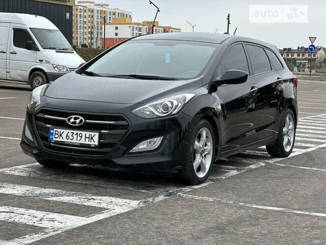 Чорний Хендай i30, об'ємом двигуна 1.58 л та пробігом 198 тис. км за 10250 $, фото 1 на Automoto.ua