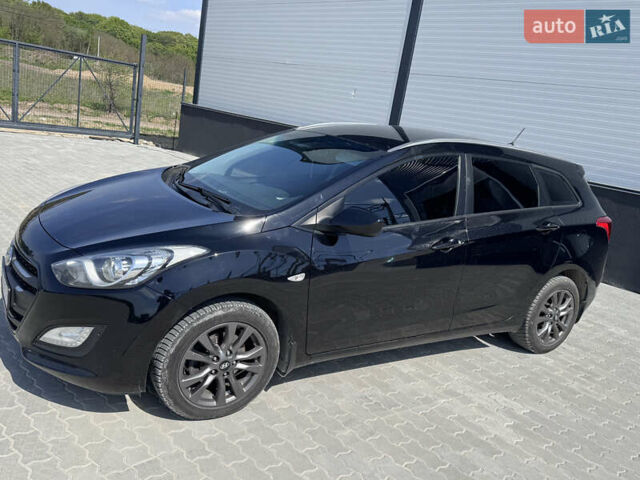 Черный Хендай i30, объемом двигателя 1.4 л и пробегом 283 тыс. км за 9500 $, фото 1 на Automoto.ua