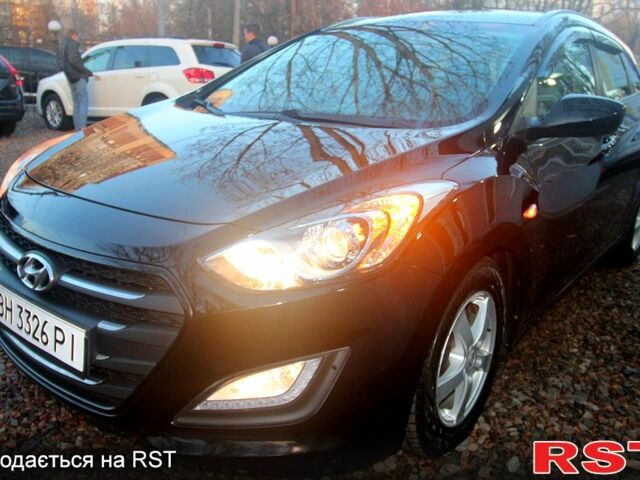 Черный Хендай i30, объемом двигателя 1.6 л и пробегом 107 тыс. км за 11200 $, фото 1 на Automoto.ua