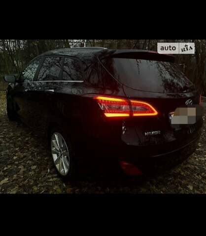 Черный Хендай i30, объемом двигателя 1.6 л и пробегом 200 тыс. км за 10400 $, фото 1 на Automoto.ua