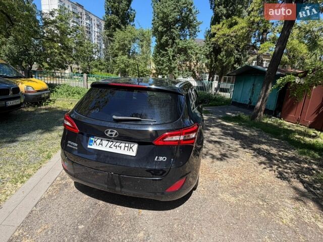 Черный Хендай i30, объемом двигателя 1.58 л и пробегом 255 тыс. км за 8900 $, фото 3 на Automoto.ua