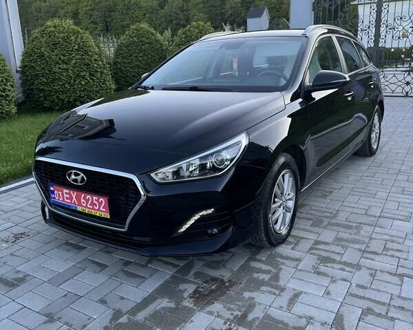 Черный Хендай i30, объемом двигателя 1.59 л и пробегом 228 тыс. км за 12300 $, фото 4 на Automoto.ua