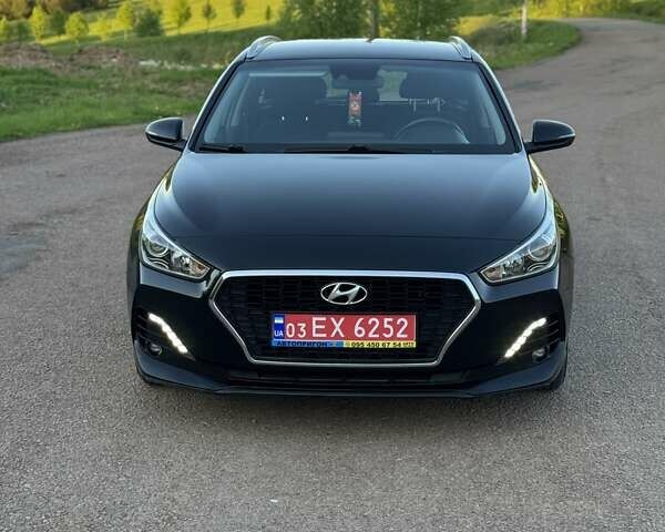 Черный Хендай i30, объемом двигателя 1.59 л и пробегом 228 тыс. км за 12300 $, фото 14 на Automoto.ua