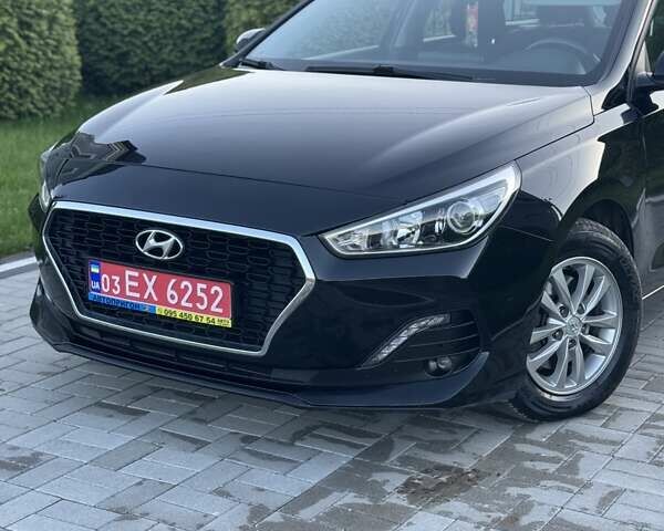 Чорний Хендай i30, об'ємом двигуна 1.59 л та пробігом 227 тис. км за 12500 $, фото 6 на Automoto.ua