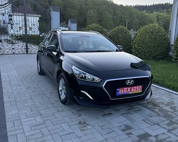 Чорний Хендай i30, об'ємом двигуна 1.59 л та пробігом 227 тис. км за 12500 $, фото 18 на Automoto.ua