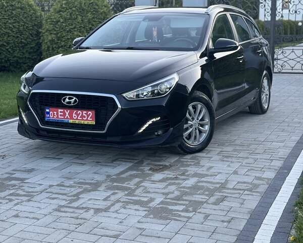 Черный Хендай i30, объемом двигателя 1.59 л и пробегом 228 тыс. км за 12300 $, фото 2 на Automoto.ua