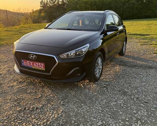 Чорний Хендай i30, об'ємом двигуна 1.59 л та пробігом 227 тис. км за 12500 $, фото 1 на Automoto.ua
