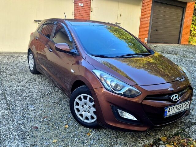 Коричневый Хендай i30, объемом двигателя 1.4 л и пробегом 148 тыс. км за 10500 $, фото 1 на Automoto.ua