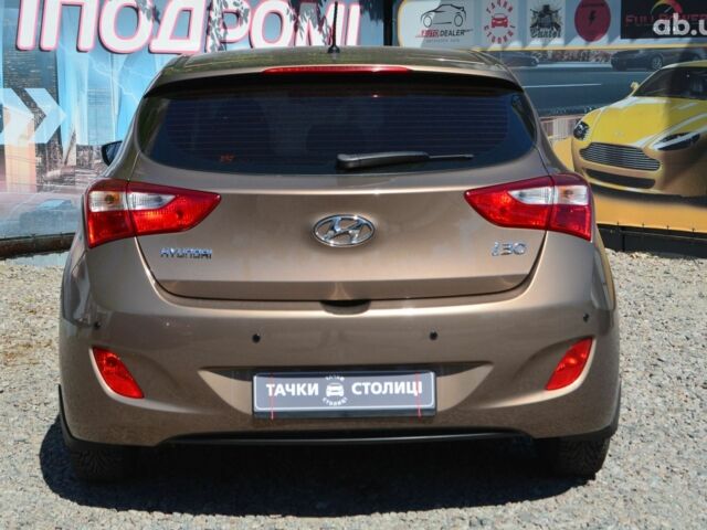 Коричневый Хендай i30, объемом двигателя 1.6 л и пробегом 65 тыс. км за 11300 $, фото 2 на Automoto.ua