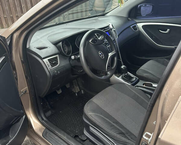 Хендай i30 2012 в Виннице на Automoto.ua Коричневый Хендай i30, объемом двигателя 1.4 л и пробегом 190 тыс. км за 7499 $, фото 11 на Automoto.ua