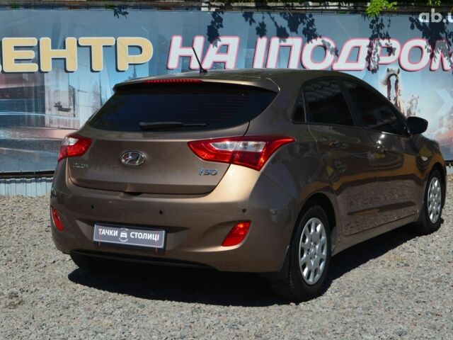 Коричневый Хендай i30, объемом двигателя 1.6 л и пробегом 65 тыс. км за 11300 $, фото 5 на Automoto.ua