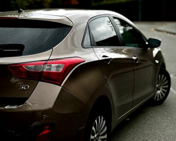 Коричневий Хендай i30, об'ємом двигуна 1.58 л та пробігом 184 тис. км за 9500 $, фото 1 на Automoto.ua