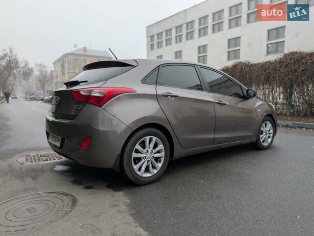 Коричневый Хендай i30, объемом двигателя 1.4 л и пробегом 293 тыс. км за 6600 $, фото 7 на Automoto.ua