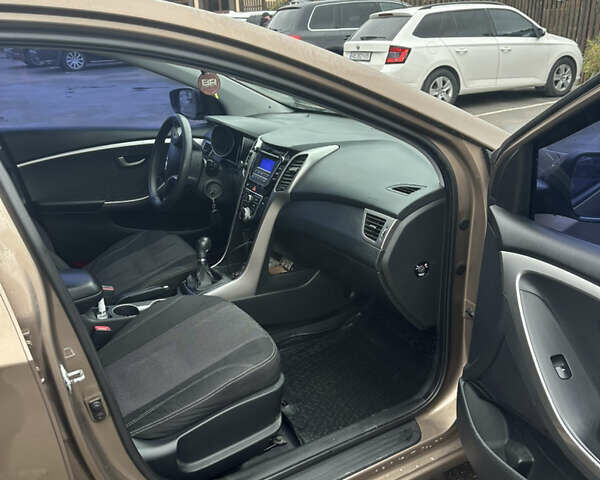 Хендай i30 2012 в Виннице на Automoto.ua Коричневый Хендай i30, объемом двигателя 1.4 л и пробегом 190 тыс. км за 7499 $, фото 10 на Automoto.ua
