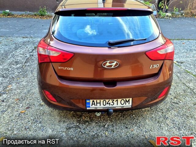 Коричневый Хендай i30, объемом двигателя 1.4 л и пробегом 148 тыс. км за 10500 $, фото 5 на Automoto.ua