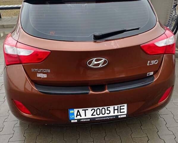 Коричневый Хендай i30, объемом двигателя 1.6 л и пробегом 238 тыс. км за 7200 $, фото 6 на Automoto.ua
