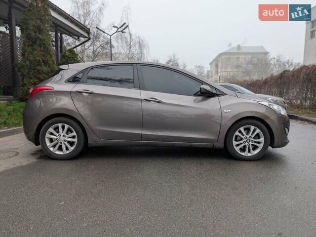 Коричневый Хендай i30, объемом двигателя 1.4 л и пробегом 293 тыс. км за 6600 $, фото 8 на Automoto.ua