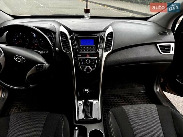 Коричневий Хендай i30, об'ємом двигуна 1.58 л та пробігом 184 тис. км за 9500 $, фото 18 на Automoto.ua