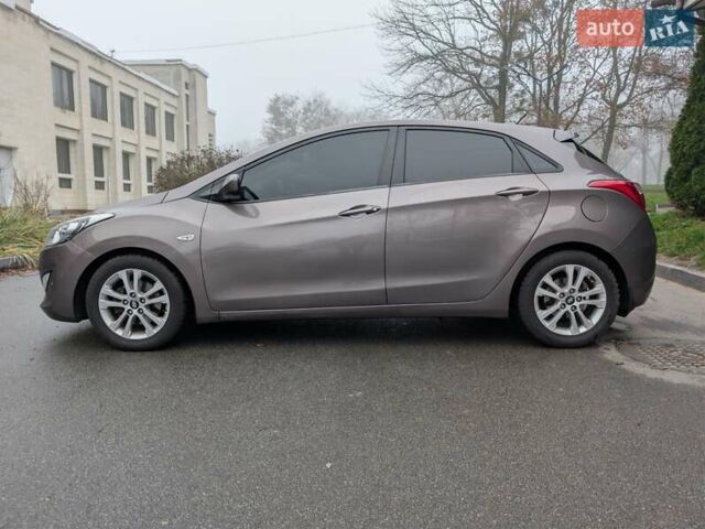 Коричневый Хендай i30, объемом двигателя 1.4 л и пробегом 293 тыс. км за 6600 $, фото 3 на Automoto.ua