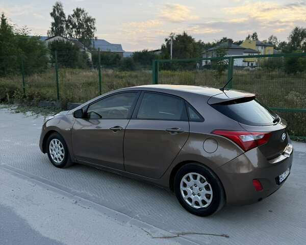 Коричневий Хендай i30, об'ємом двигуна 1.4 л та пробігом 220 тис. км за 6500 $, фото 4 на Automoto.ua