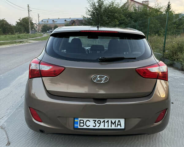 Коричневий Хендай i30, об'ємом двигуна 1.4 л та пробігом 220 тис. км за 6500 $, фото 10 на Automoto.ua