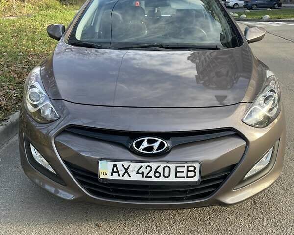 Коричневый Хендай i30, объемом двигателя 1.59 л и пробегом 112 тыс. км за 10500 $, фото 2 на Automoto.ua