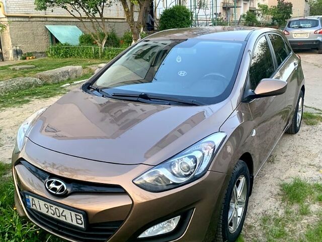 Коричневый Хендай i30, объемом двигателя 1.3 л и пробегом 158 тыс. км за 7500 $, фото 1 на Automoto.ua